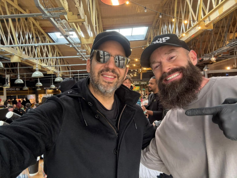 David Blaine and Fran are taking a selfie at RUUD Coffee Shop.
